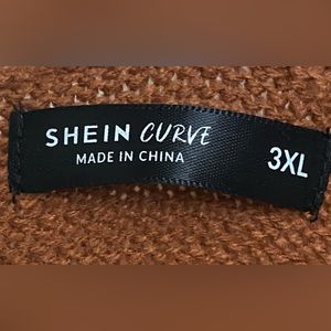 Brown sweater with fringe sleeves!